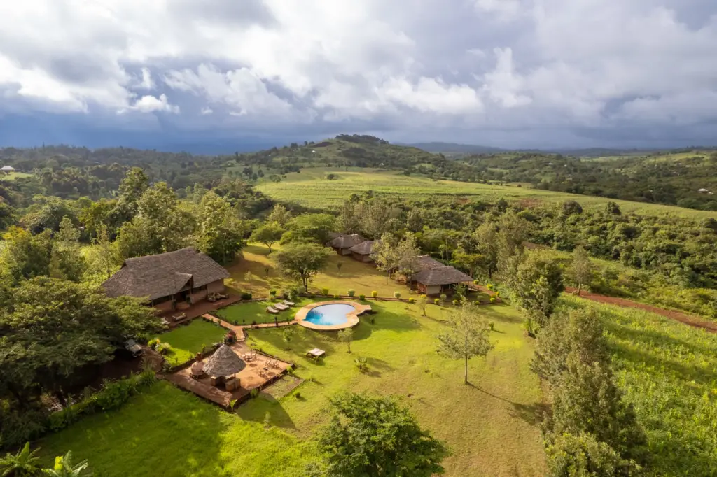 A drone image of Karatu farmland and Karatu Tented Lodge