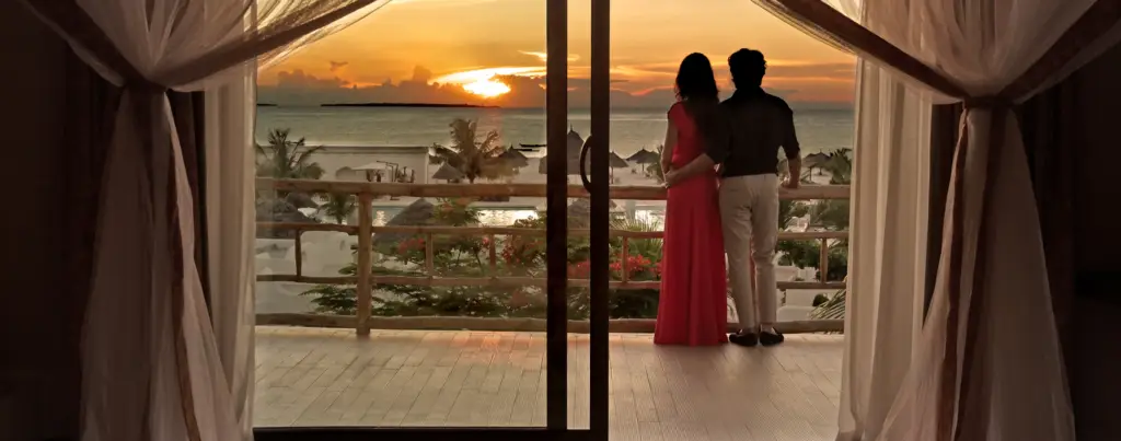 Couple Enjoying Ocean view from Gold Zanzibar Hotel Deluxe Rooms
