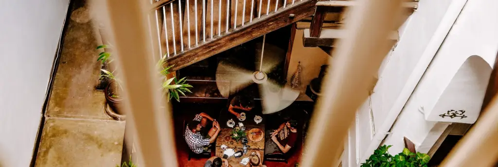 Tourist sitting and enjoying coffee at the Lounge of Zanzibar Cofee House