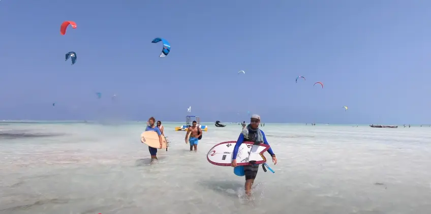 A scene of surfing and kitesurfing from zanzibar paje Beach