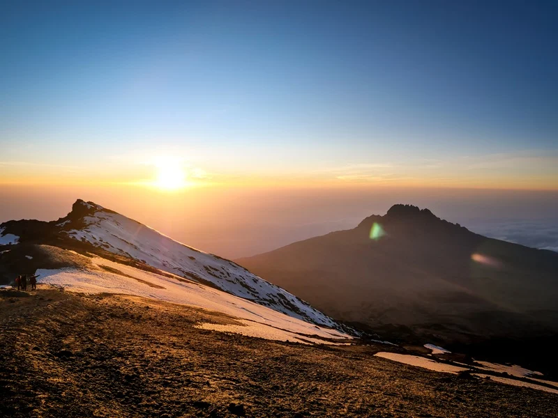 Sunrise over a volcanic crater rim on Kilimanjaro