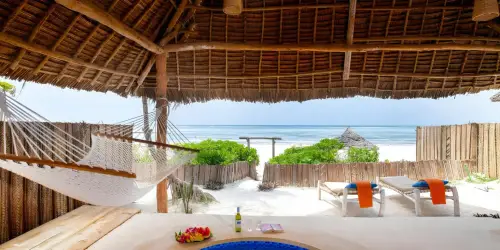 Beachfront private pool bandas at Zanzibar Sunrise Beach Resort