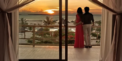 Couple on an ocean-view terrace at Gold Zanzibar in Kendwa