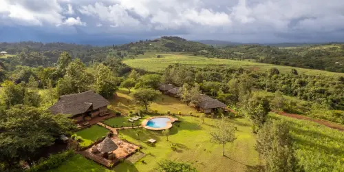 A drone image of Karatu farmland and Karatu Tented Lodge