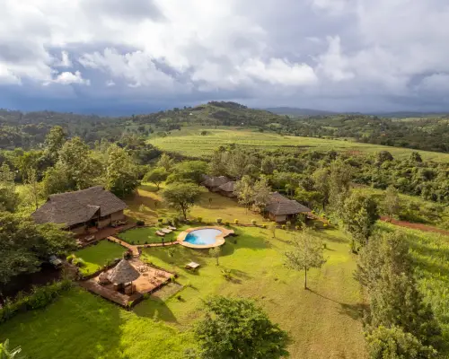 A drone image of Karatu farmland and Karatu Tented Lodge