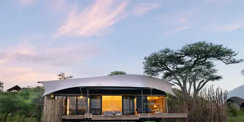 Outside view of the suite of Lemala Nanyukie Lodge at The Evening