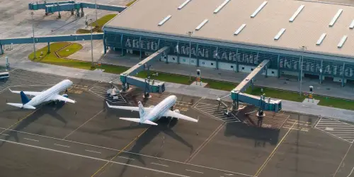 Aerial view of zanzibar airport with plans parked in the the parking