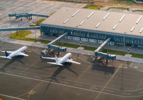 Aerial view of zanzibar airport with plans parked in the the parking
